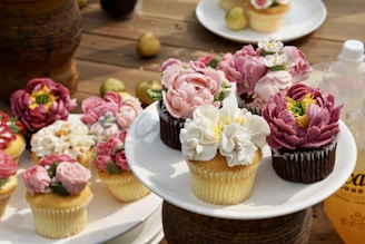 Close-up of colorful cupcakes decorated with fresh fruits.