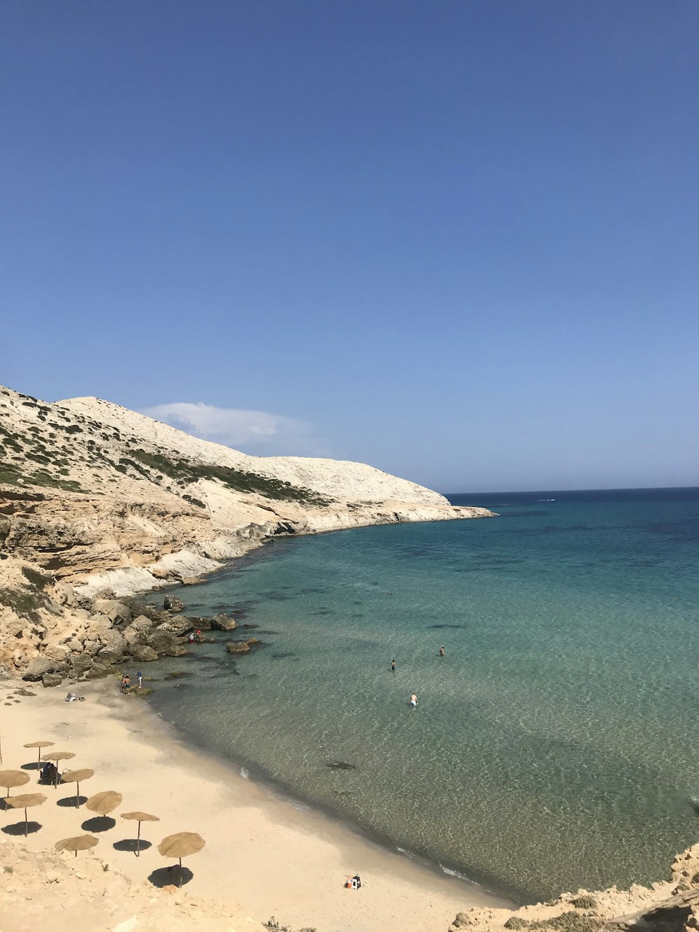 white sand beach during daytime