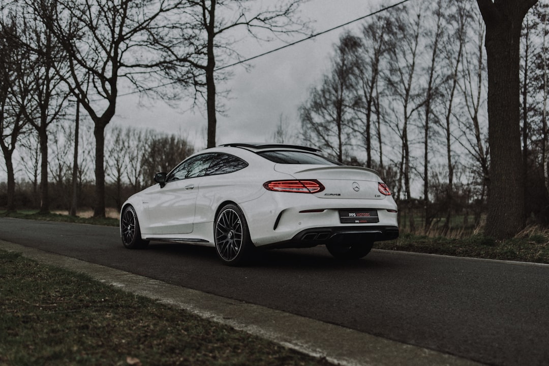 white bmw m 3 coupe on road during daytime