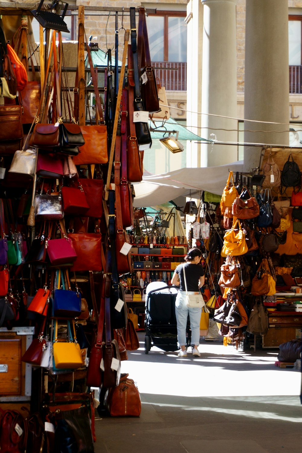 red and black leather bags on display