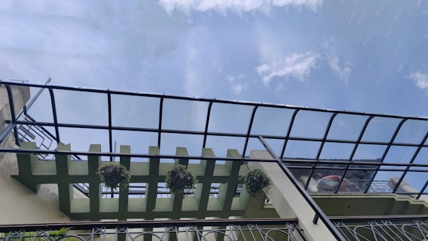 Exterior view of Jarun Pharmaceuticals facility in Ahmedabad under a clear sky.