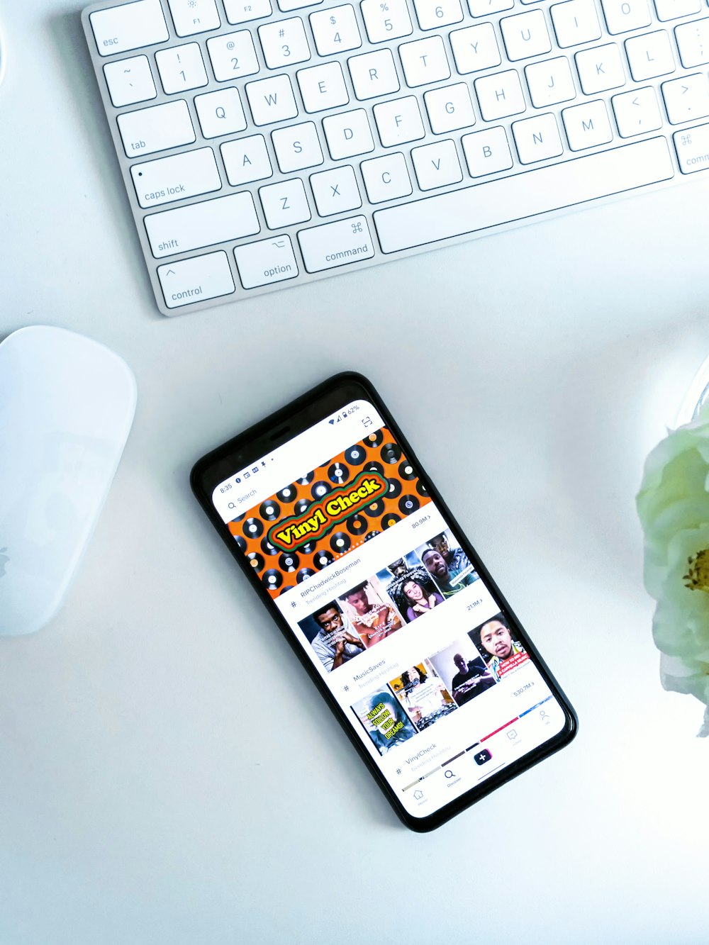 black iphone 7 on white table photo