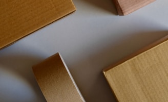 brown wooden board on white surface