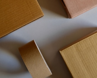 brown wooden board on white surface