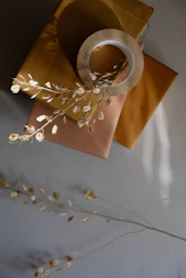 brown and white floral paper bag