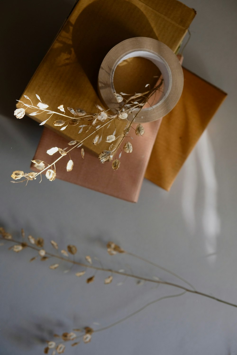brown and white floral paper bag