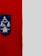 A wall is divided into two sections with a vertical boundary. The left side is a deep red color, while the right side is light gray. Mounted on the red section is a blue sign featuring symbols for accessibility, indicating services for people with disabilities, including figures of a wheelchair, a person with a cane, and a person with a stroller. Below these symbols, the words 'CALL HEAR' and a website link are displayed.