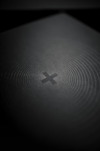 black and white cross illustration