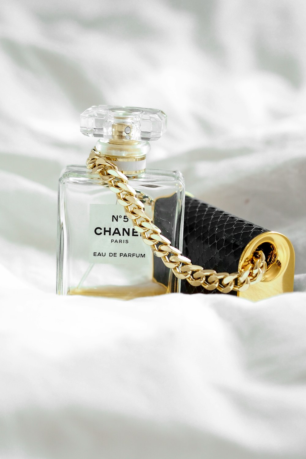 gold and black perfume bottle