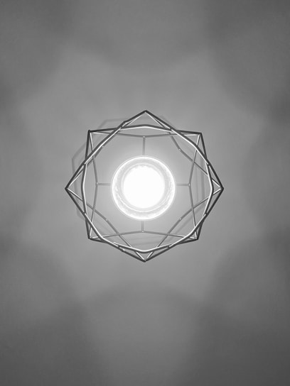 white and black round ceiling lamp