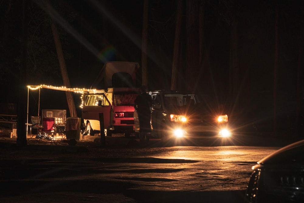 red truck on road during night time