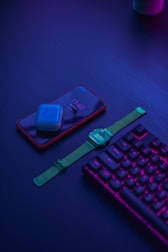 blue apple watch with green strap