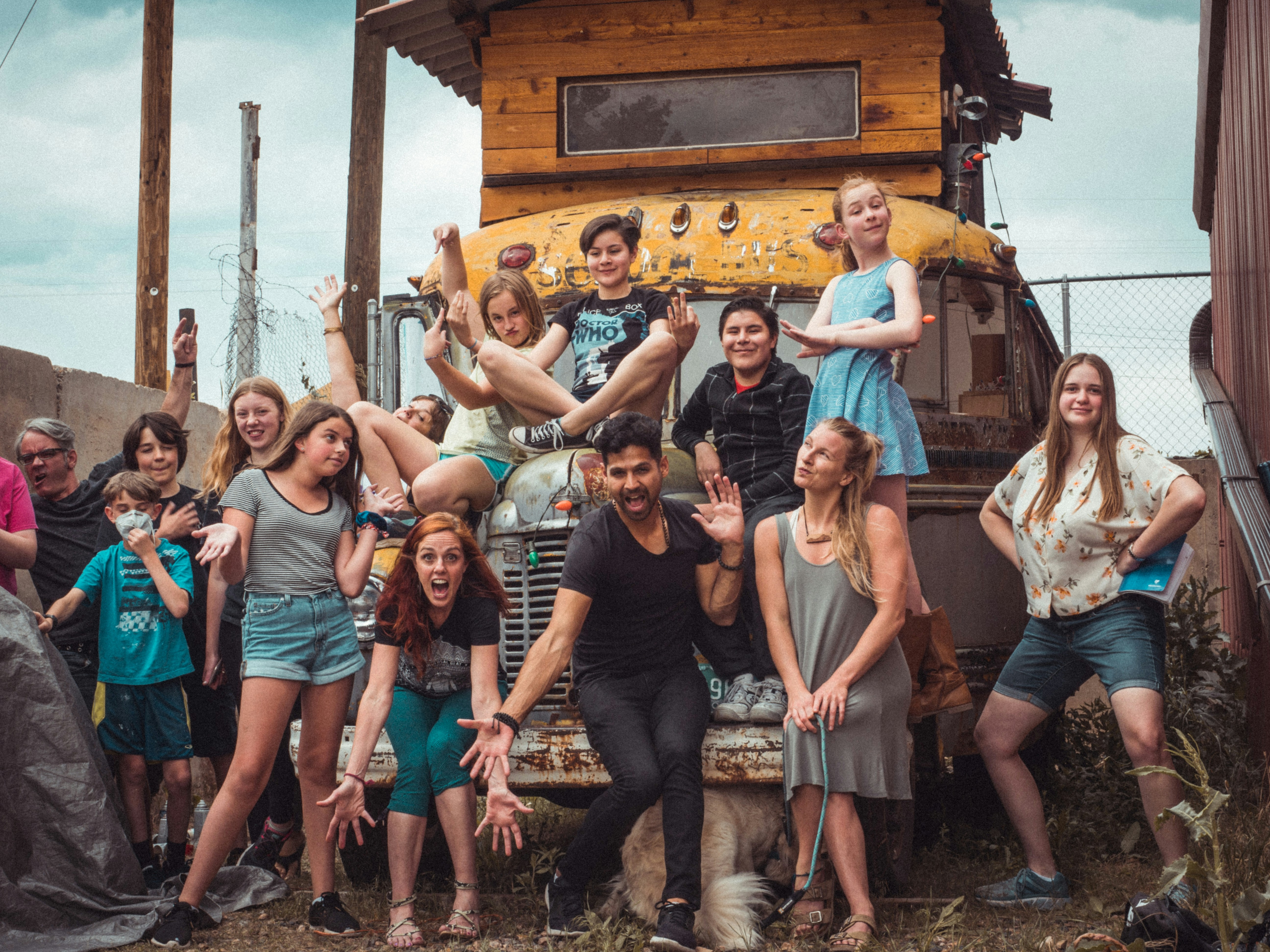 great photo recipe,how to photograph group of people standing near brown wooden house during daytime