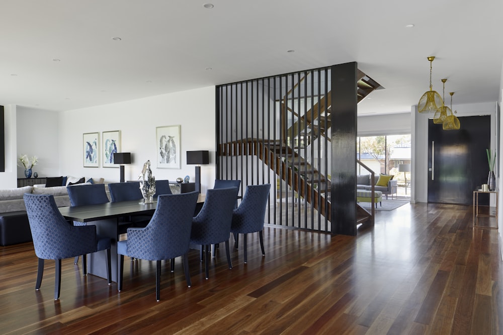 black wooden table and chairs