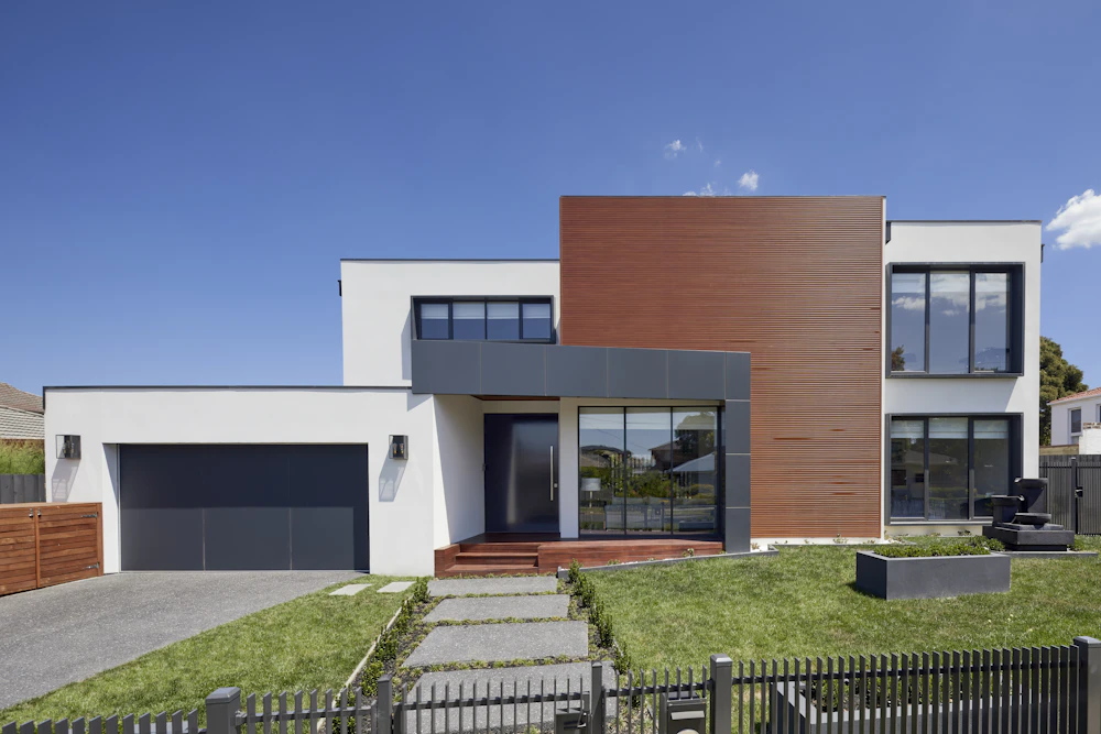 Concrete steps and walkway at a modern home entry