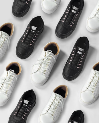 white and black adidas sneakers