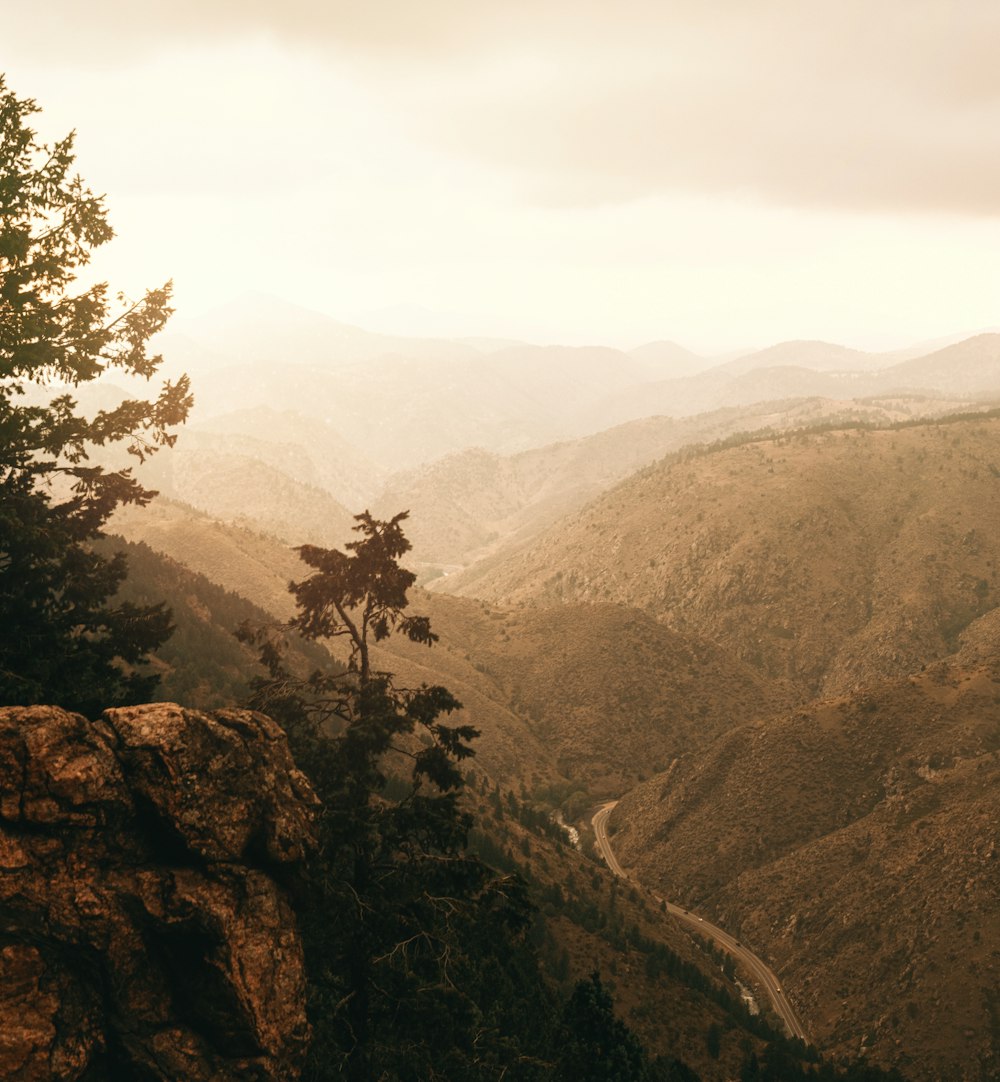 person standing on rock formation during daytime