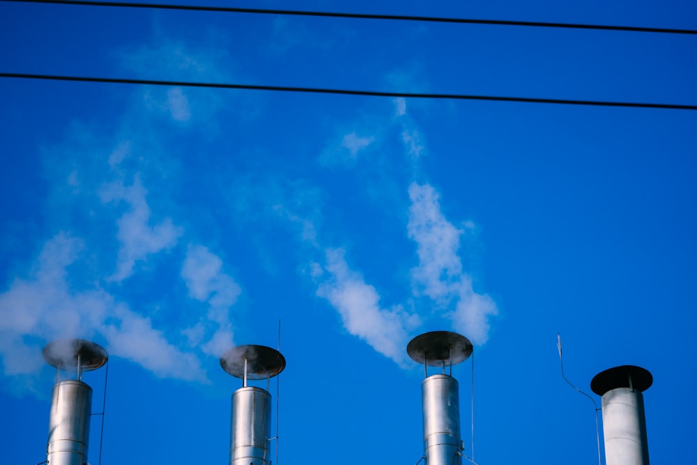 gray metal pipe under blue sky