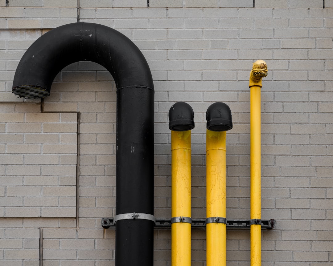 yellow and black metal pipe