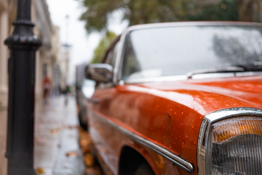 red and white car on road during daytime