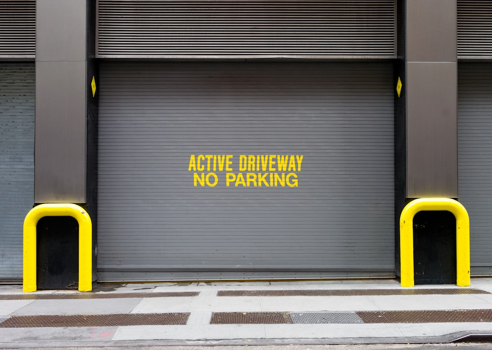 yellow and black caution wet floor sign