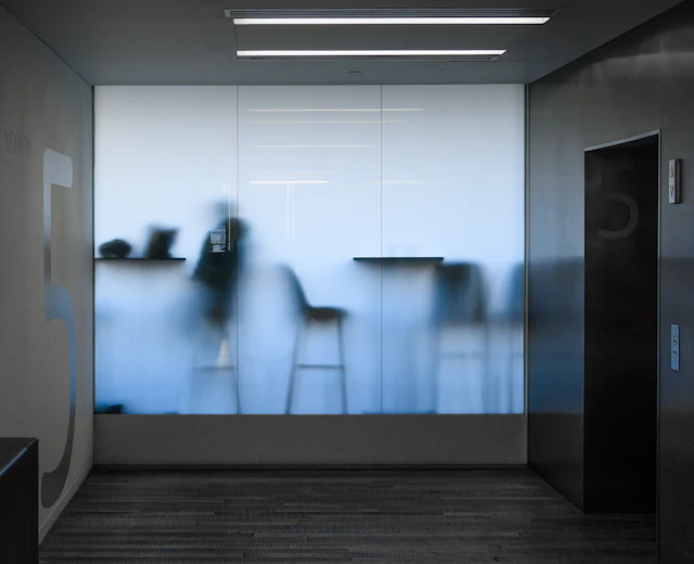 Frosted Glass Door — commercial glass partition interior design