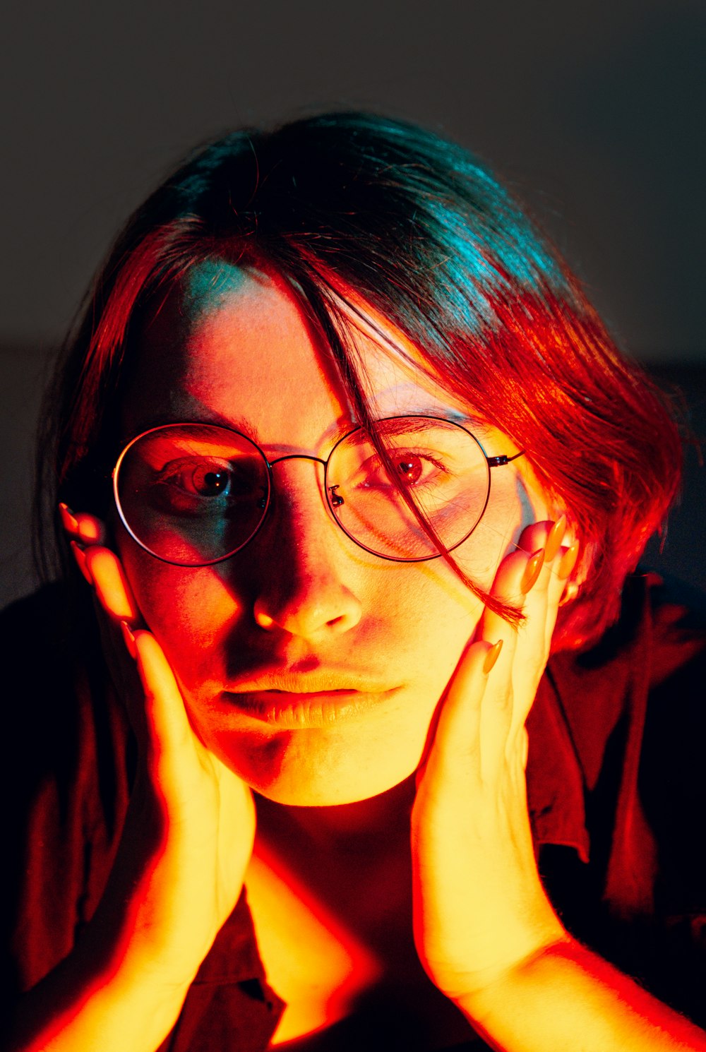 woman in black framed eyeglasses