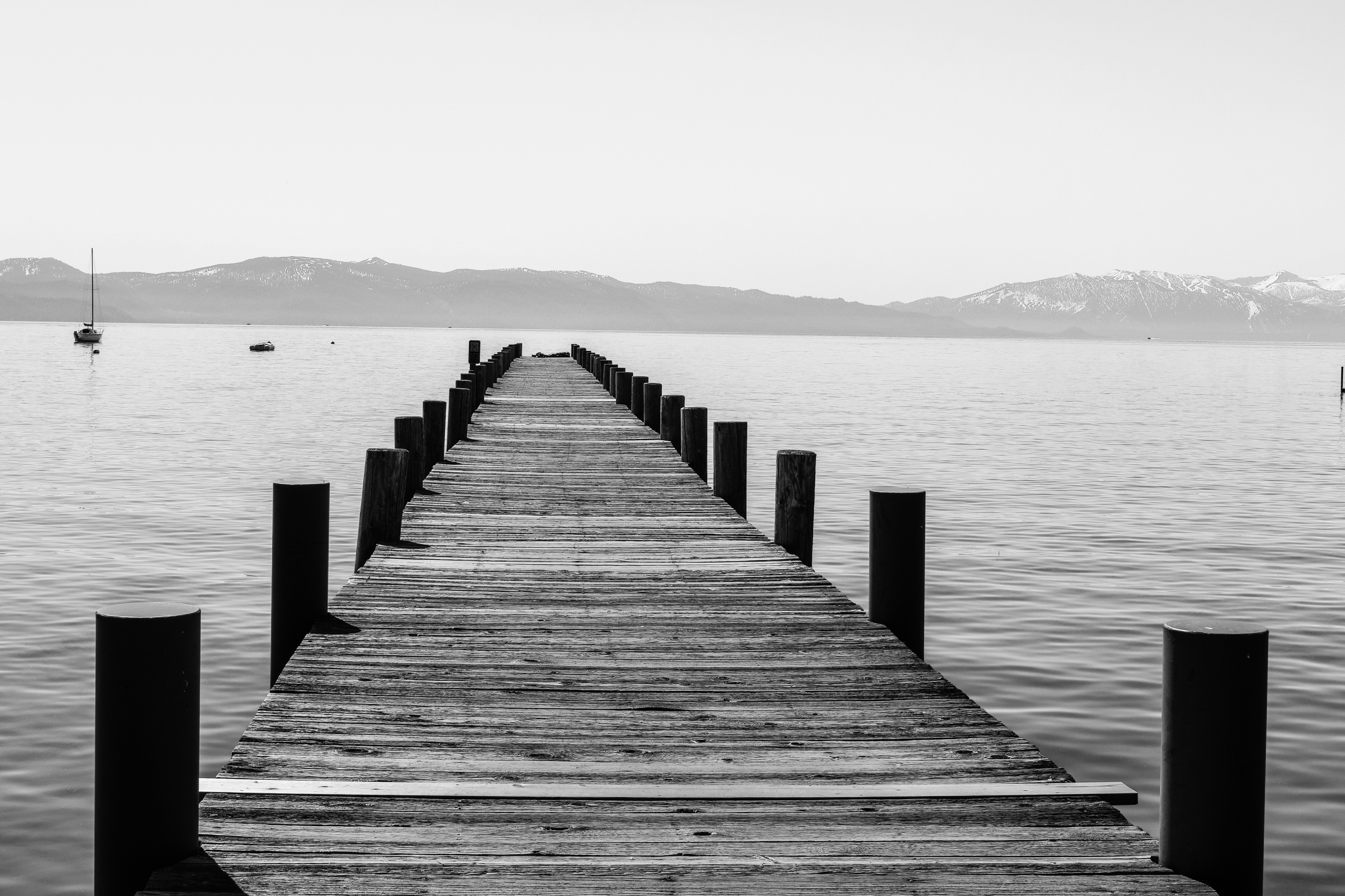 brown wooden dock on sea during daytime