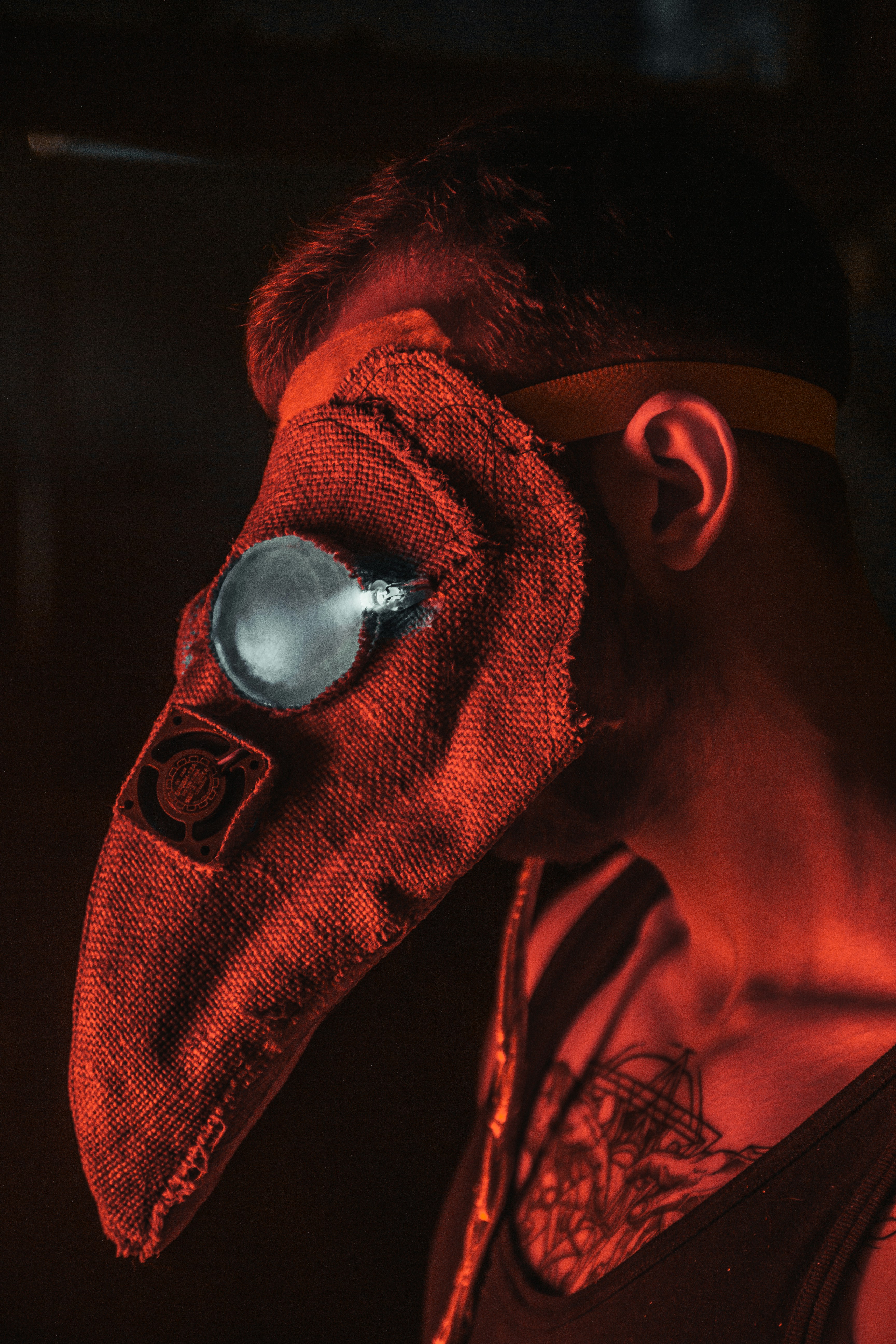 man in red knit cap wearing sunglasses