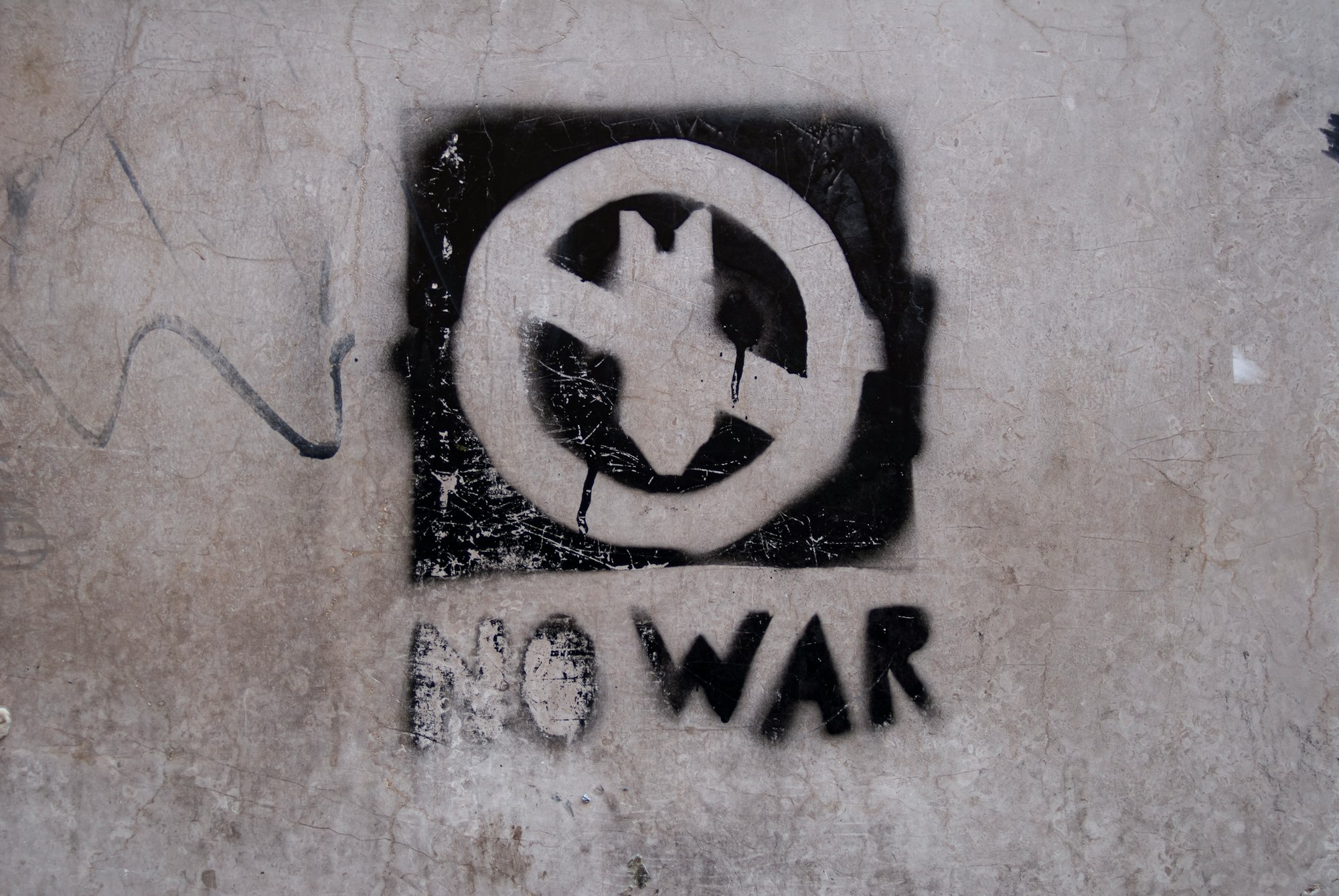 Stencil on the wall of the house.