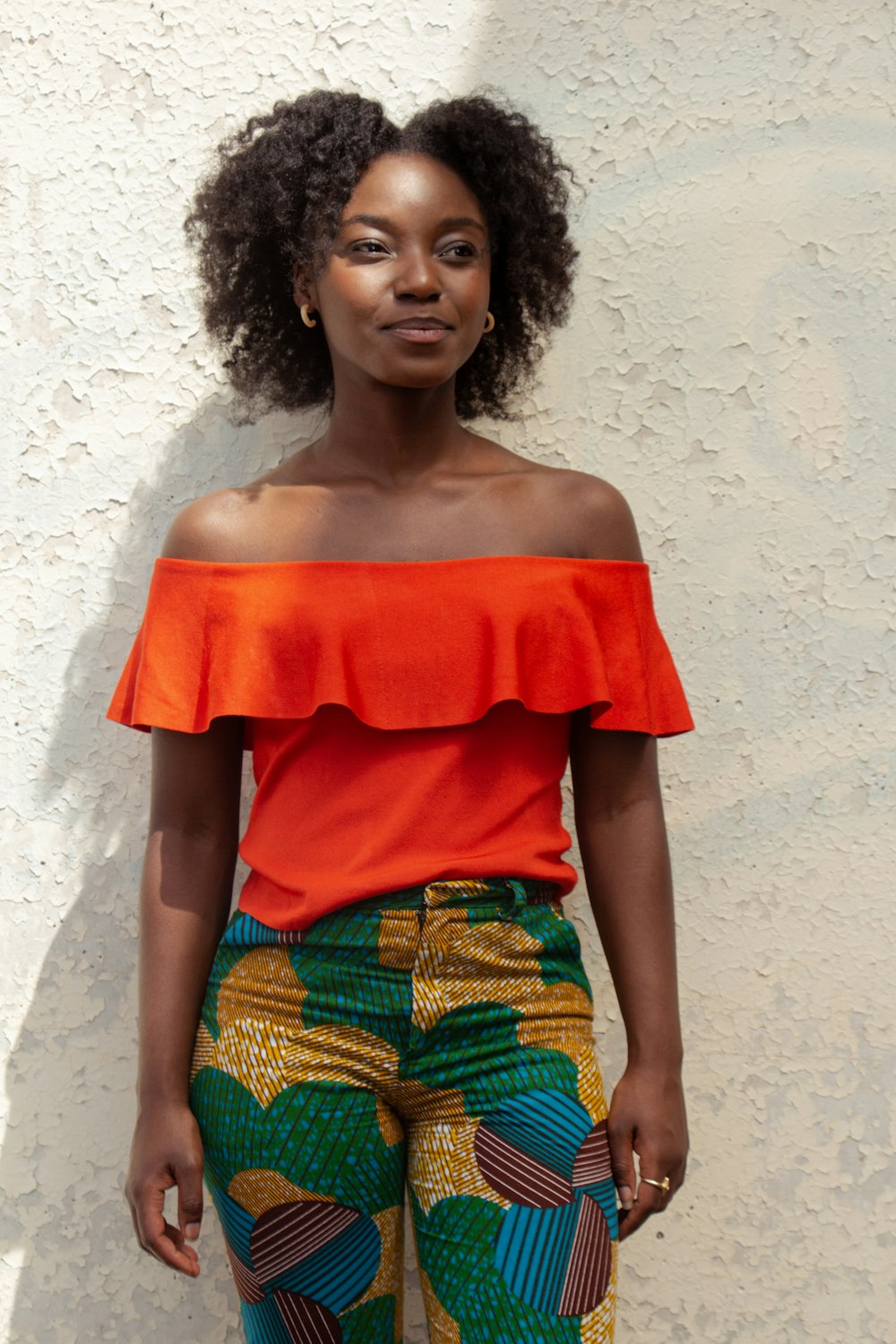 woman in red off shoulder shirt