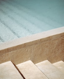 blue swimming pool during daytime