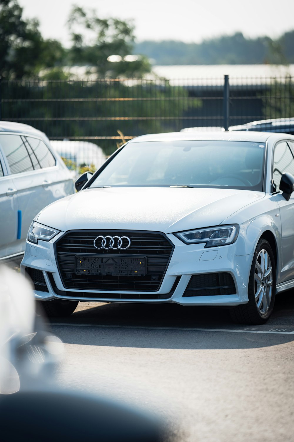 white audi a 4 coupe