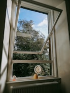 white wooden framed glass window