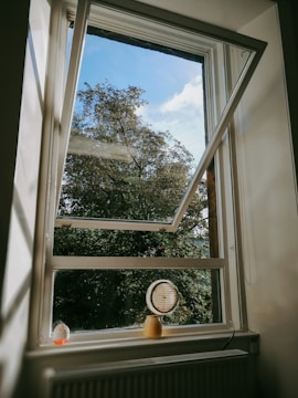 white wooden framed glass window