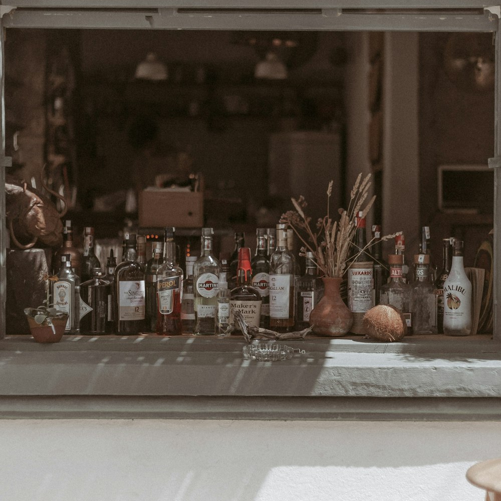 clear glass bottles on table