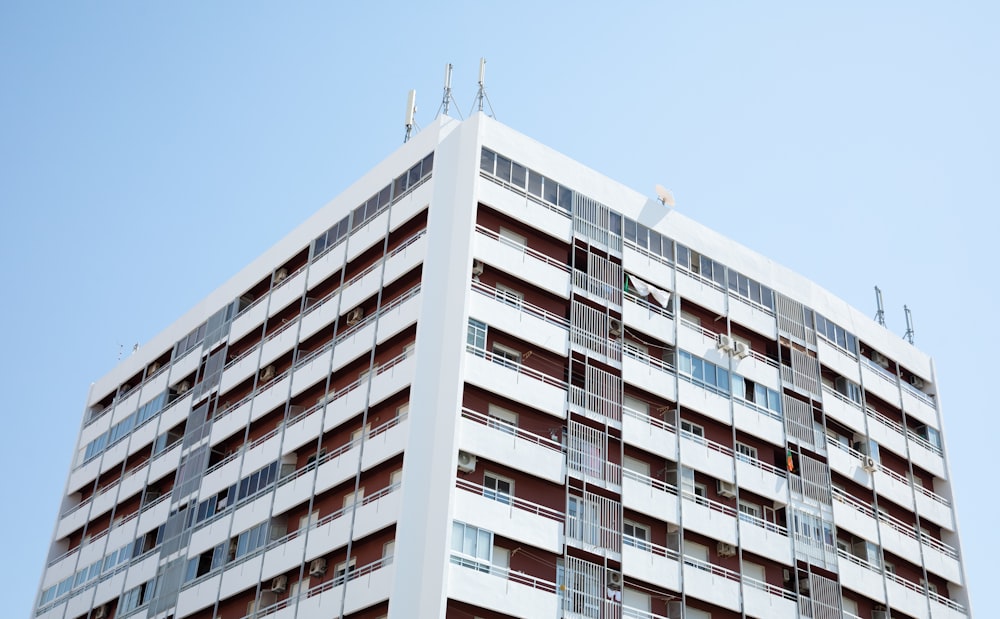 white concrete building under blue sky during daytime