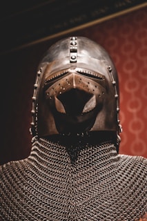 person wearing silver and black helmet