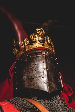 gold and red steel helmet