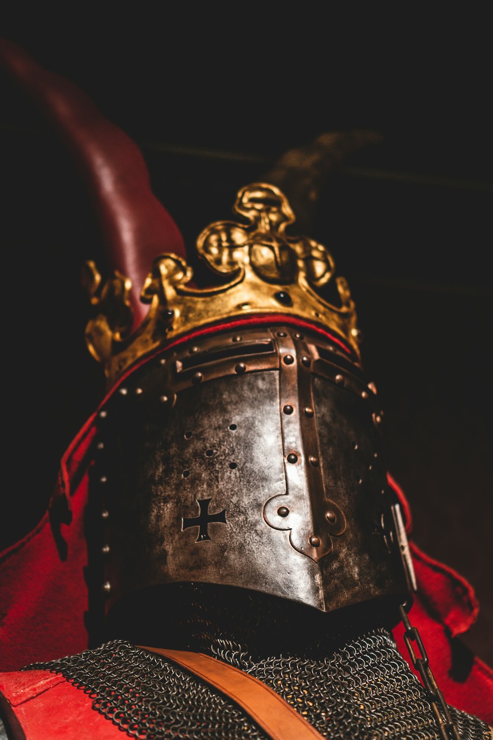 gold and red steel helmet