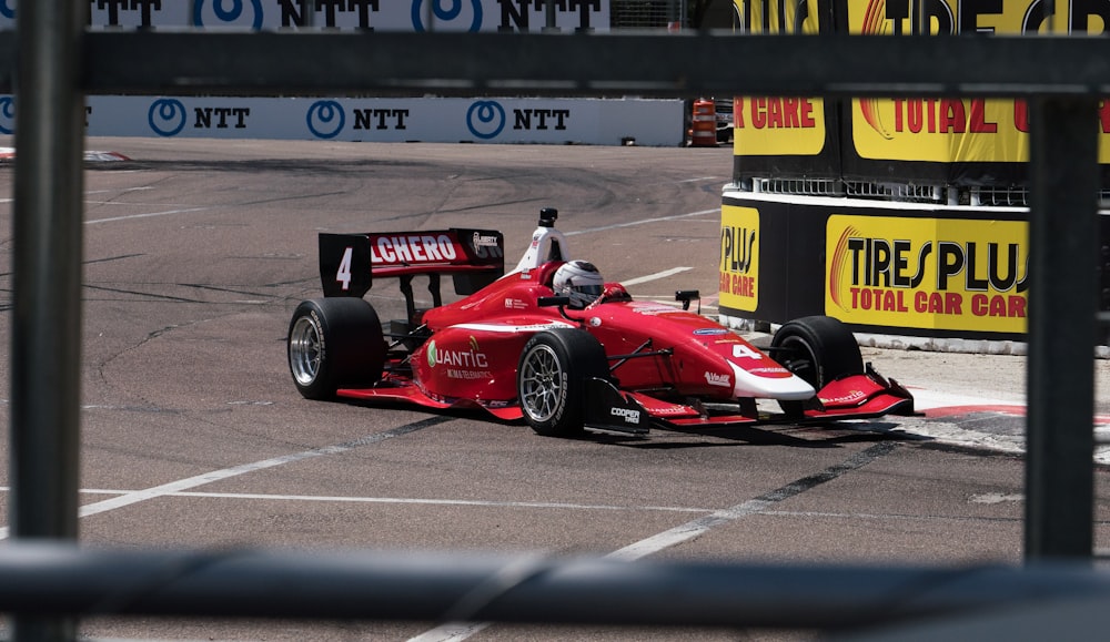 red ferrari f 1 on race track