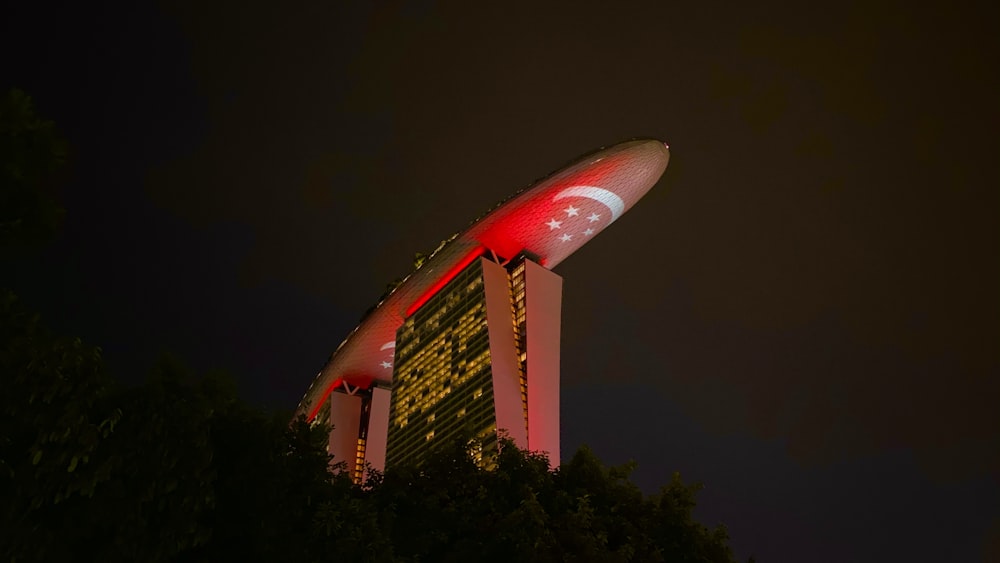 red and white space ship during night time