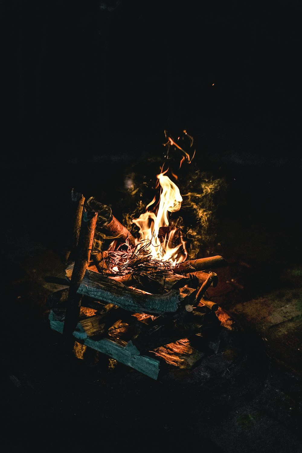 fire on brown wooden table