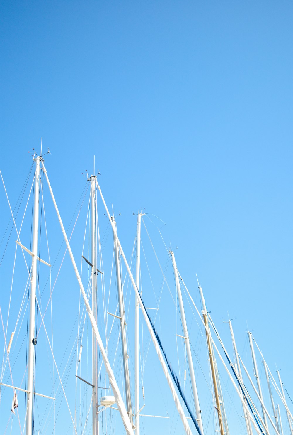 white metal poles under blue sky during daytime