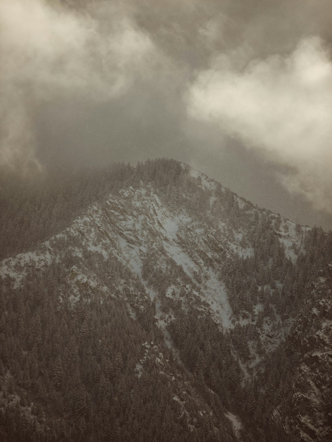 snow covered mountain during daytime