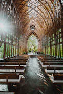 A serene holy matrimony ceremony captured with warm tones and natural light inside a beautiful chapel.