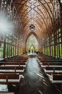 brown wooden benches inside building
