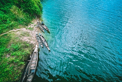 white boat on body of water during daytime bangladesh google meet background