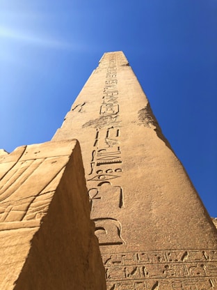 brown concrete pyramid under blue sky during daytime