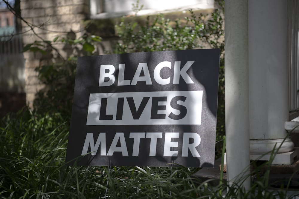 black and white wooden signage